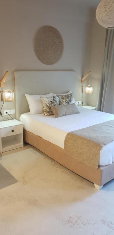 Bright modern bedroom with neutral palette.