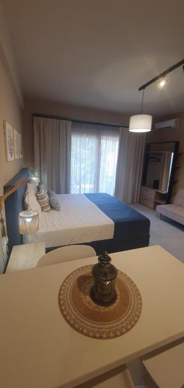 Studio bedroom/living view with neutral finishes.
