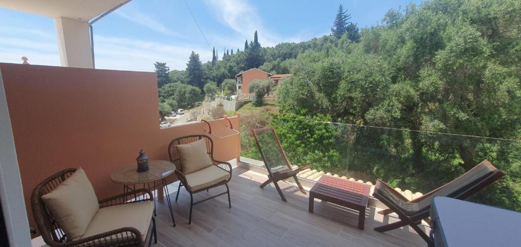 Balcony view with hillside greenery.